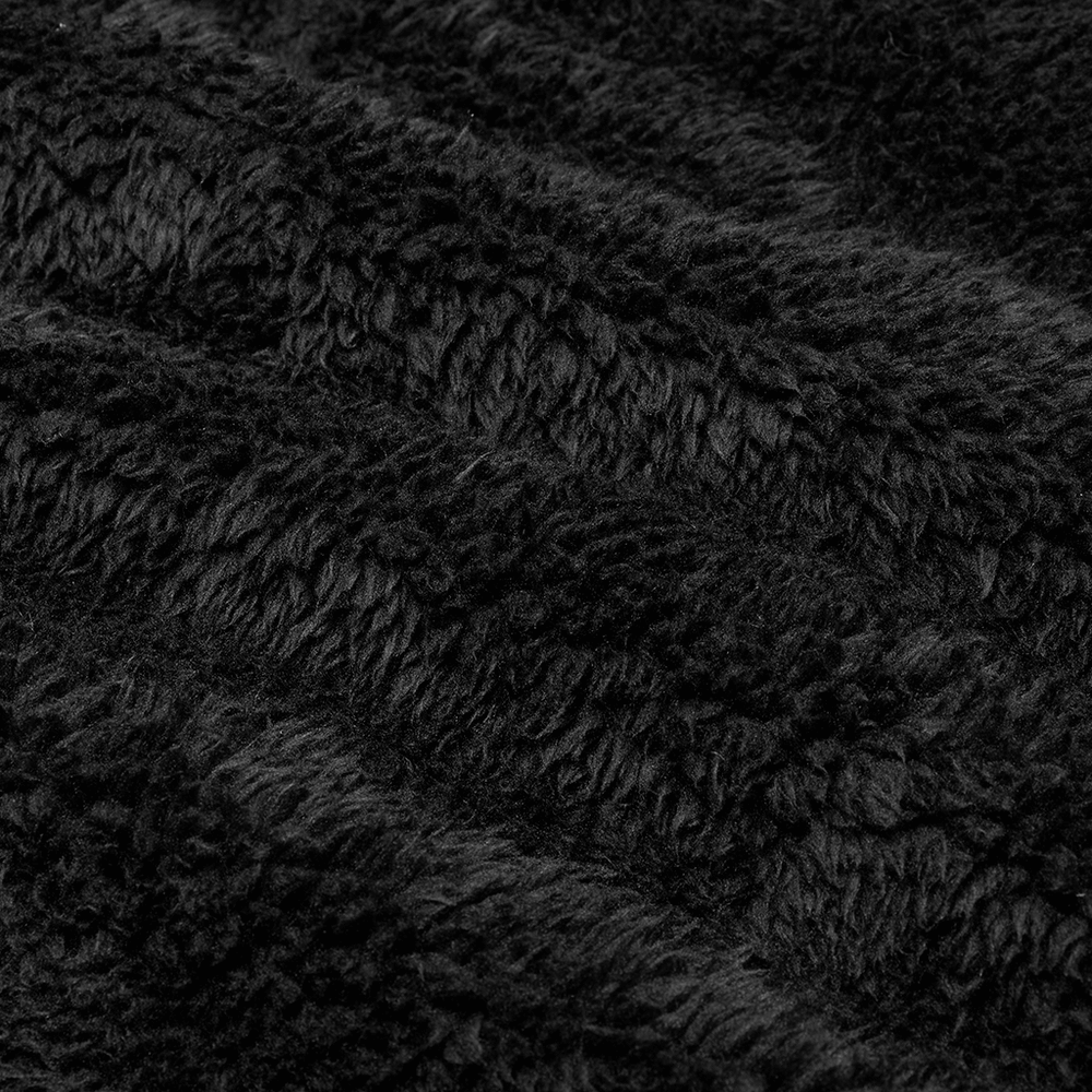 Close-up of soft, fluffy black fabric texture for warm jackets and cozy apparel.