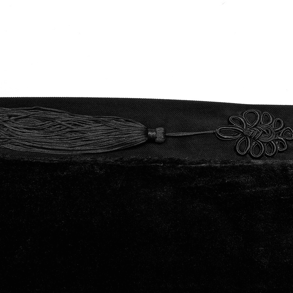 Close-up of the tassel and decorative embroidery on the Lux Velvet Gothic Cloak in black.
