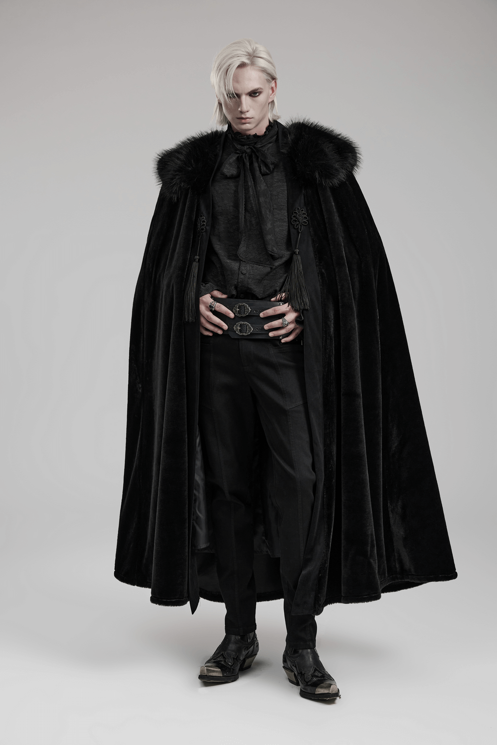 Gothic elegance embodied in a Lux Velvet Cloak with fur collar and tassels, perfect for striking style and warmth.