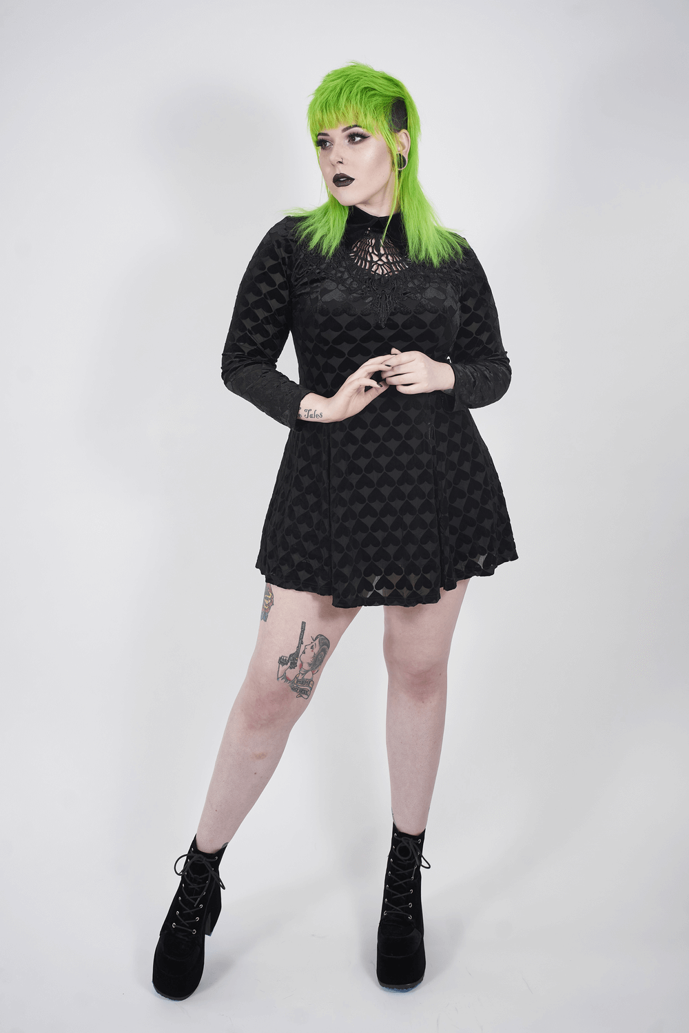 Lux Velvet Gothic Dress featuring hollow-out design and dark night vines, worn by model with green hair.