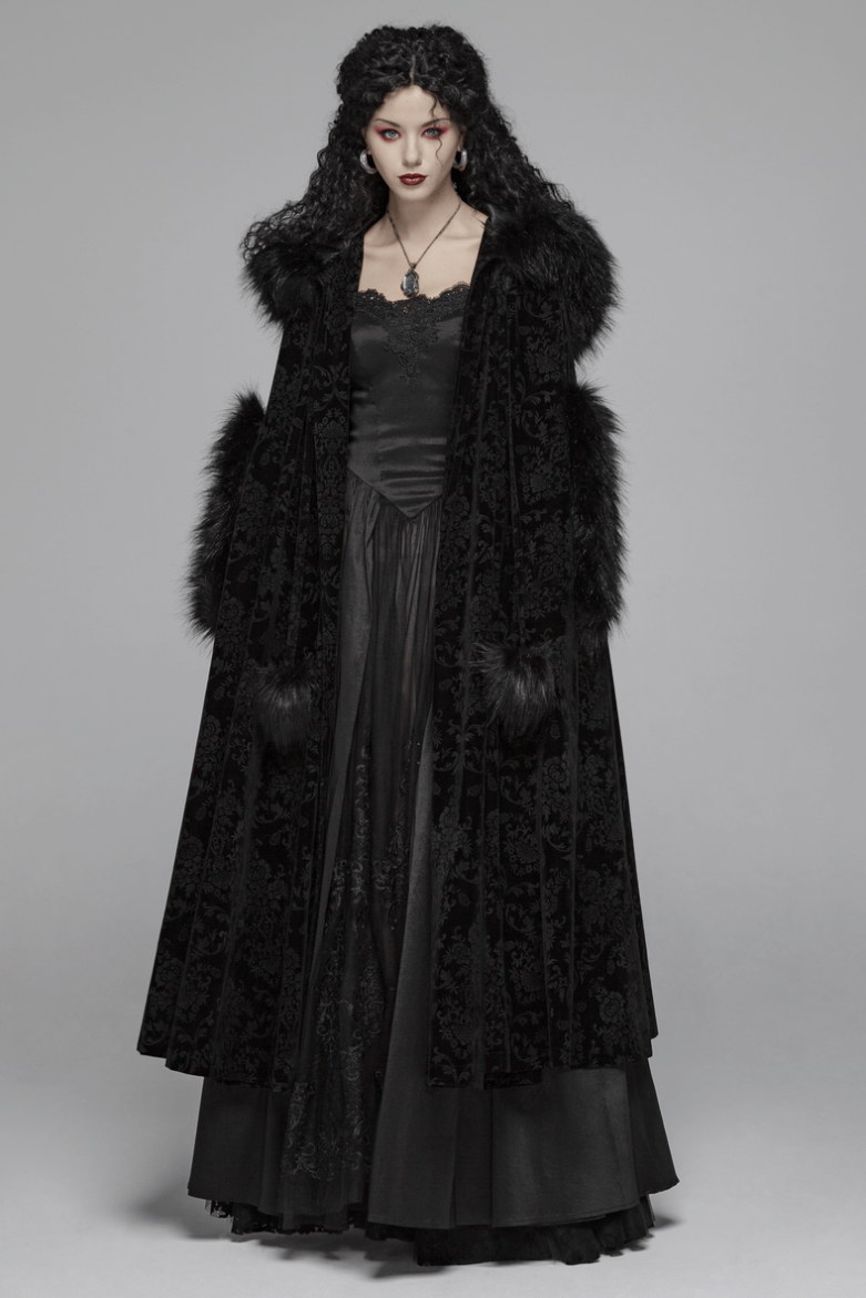 Elegant lady in a luxurious black velvet hooded Gothic cloak showcasing nocturnal elegance.