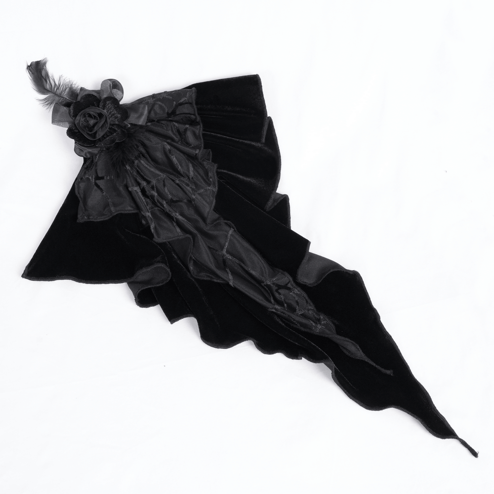 Luxurious black velvet fabric with cascading ruffles, feathers, and a decorative rose for gothic fashion flair.