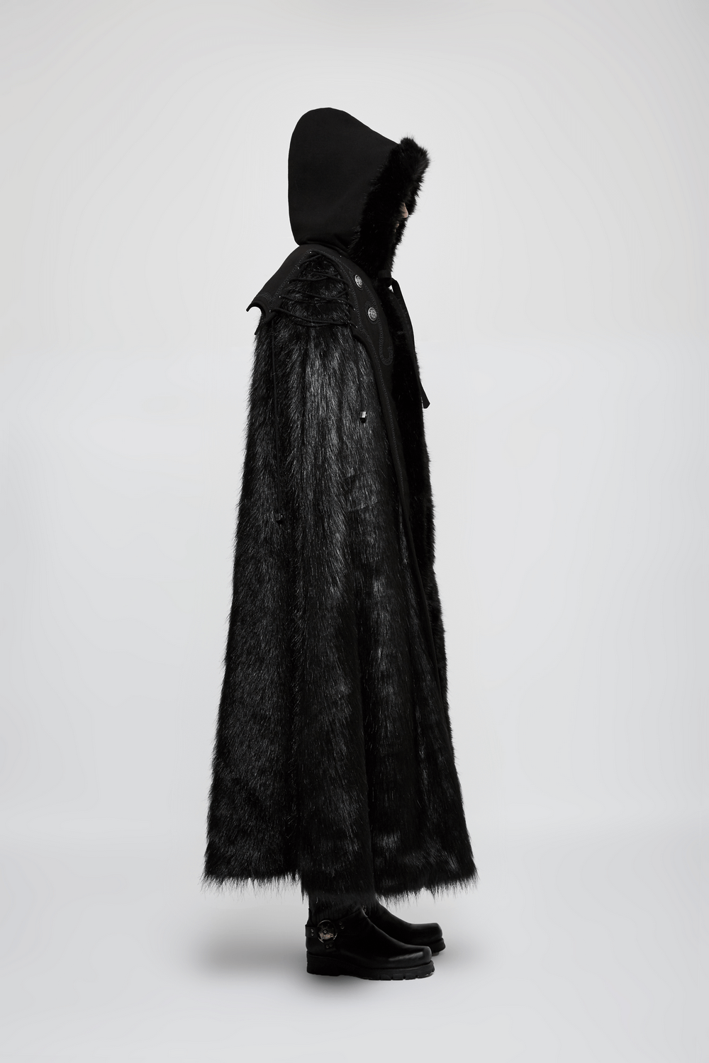 Luxurious Gothic witch fur-trimmed long cloak with hood, showcasing dark elegance and chic winter style.