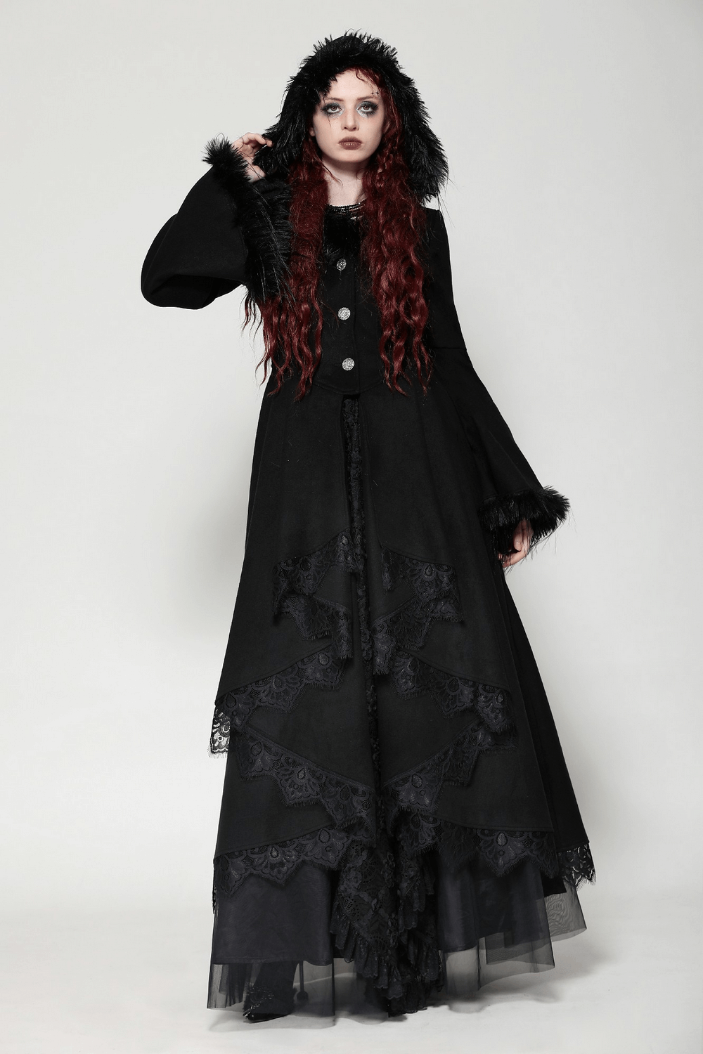 Elegant black lace-trimmed gothic hooded coat for women with fur lining, featuring silver-tone buttons and an asymmetrical design.