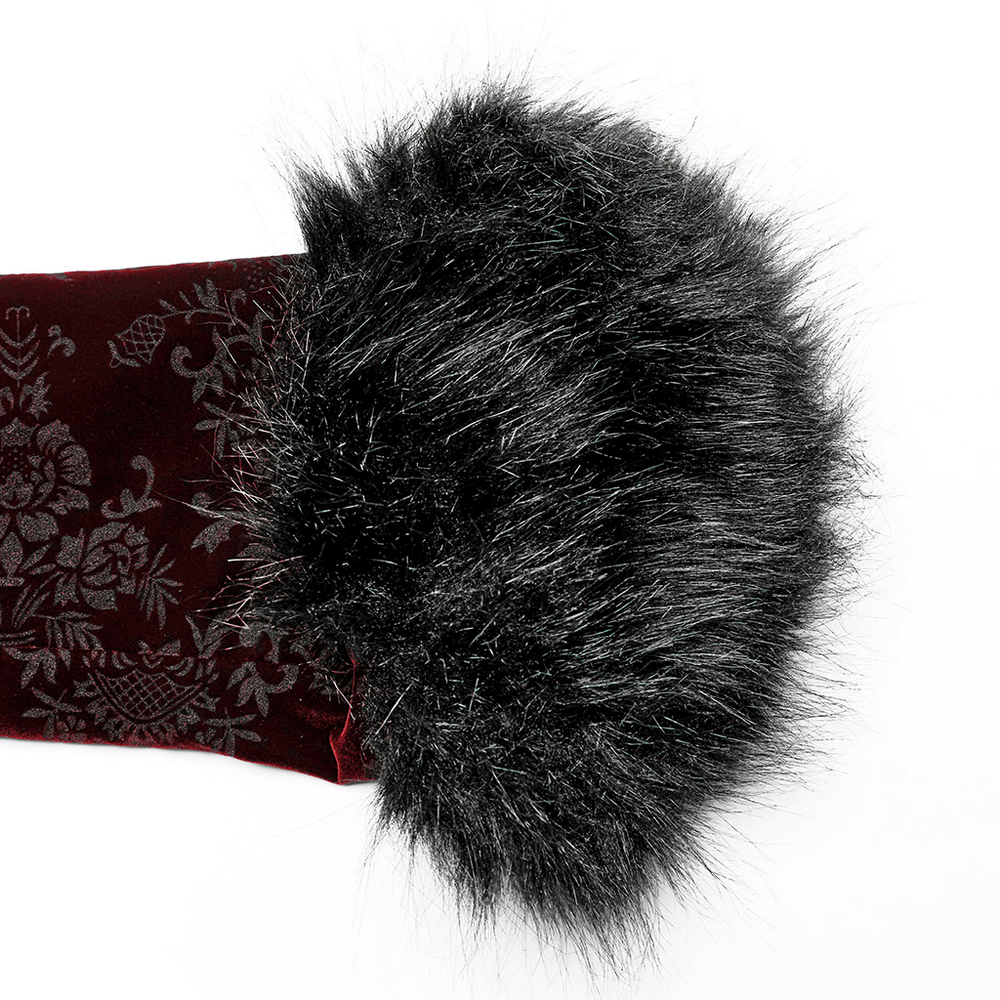 Close-up of luxurious black fur trim on a rich velvet gothic jacket, showcasing elegant texture and opulence.