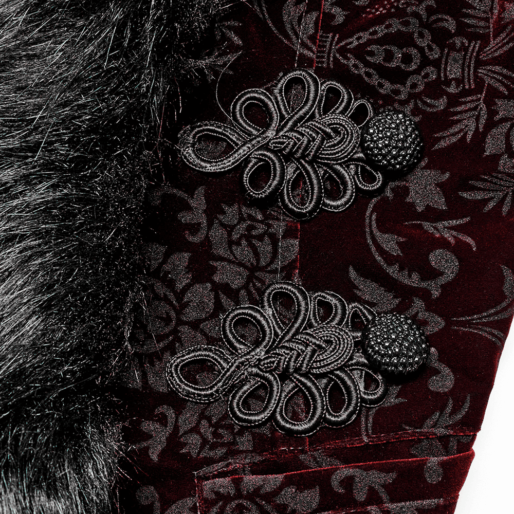 Close-up of luxurious velvet jacket with ornate black buttons and fur trim, showcasing gothic elegance.