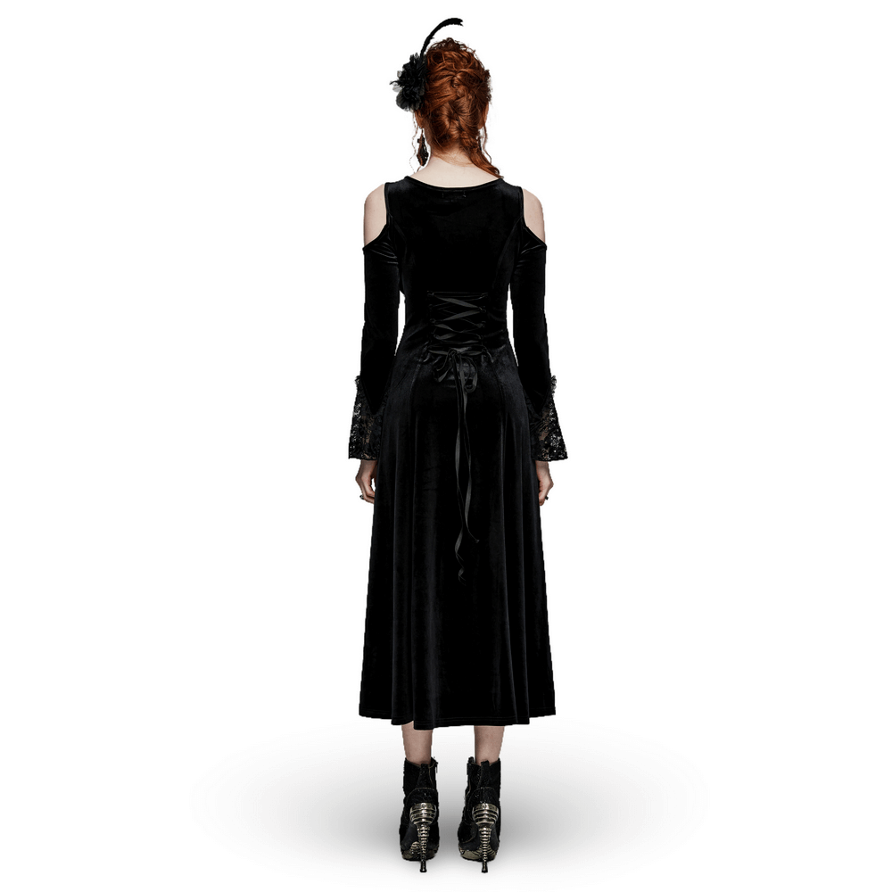 Back view of a luxurious velvet goth gown with lace details, showcasing a sultry silhouette and elegant design.