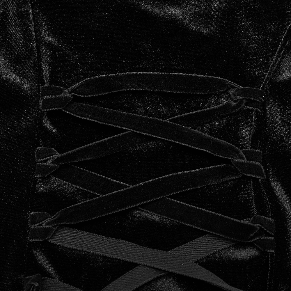 Close-up of black velvet detail featuring intricate lacing design, perfect for goth fashion.