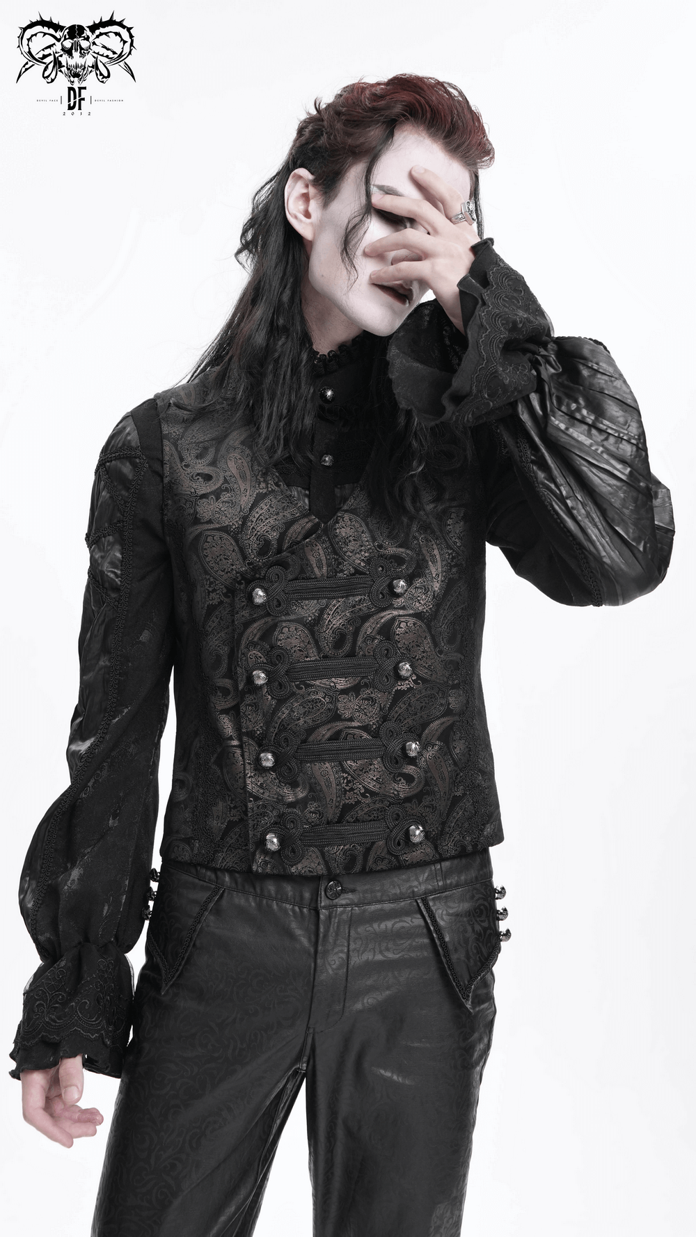 Male model wearing a luxurious black gothic waistcoat with intricate silver buttons and ornate detailing, perfect for alternative fashion.