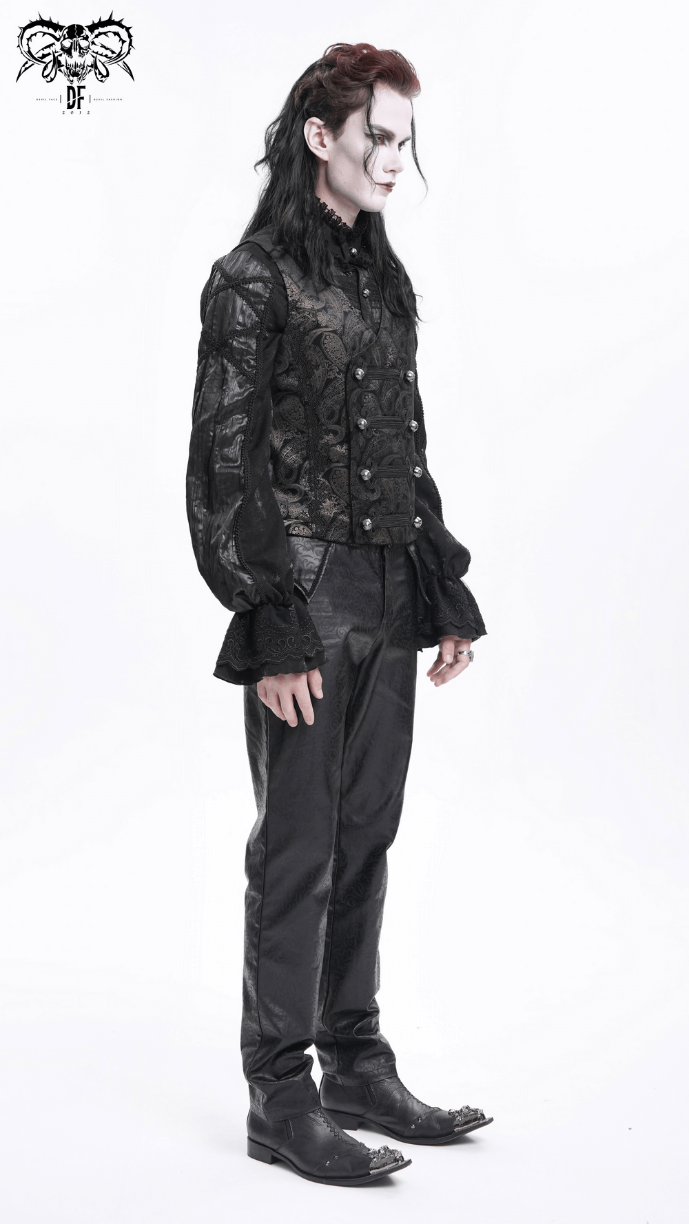 Stylish male in a gothic vintage waistcoat with intricate silver buttons, showcasing a brocade paisley pattern and tailored fit.