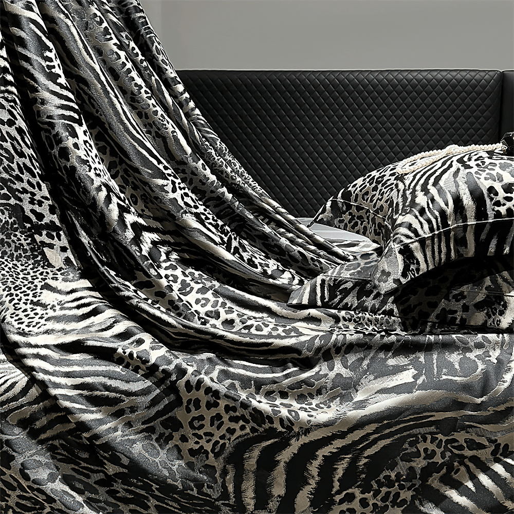 Luxury Leopard Jacquard Egyptian Cotton Bedding Set draped elegantly on a stylish bed, showcasing its rich patterns.
