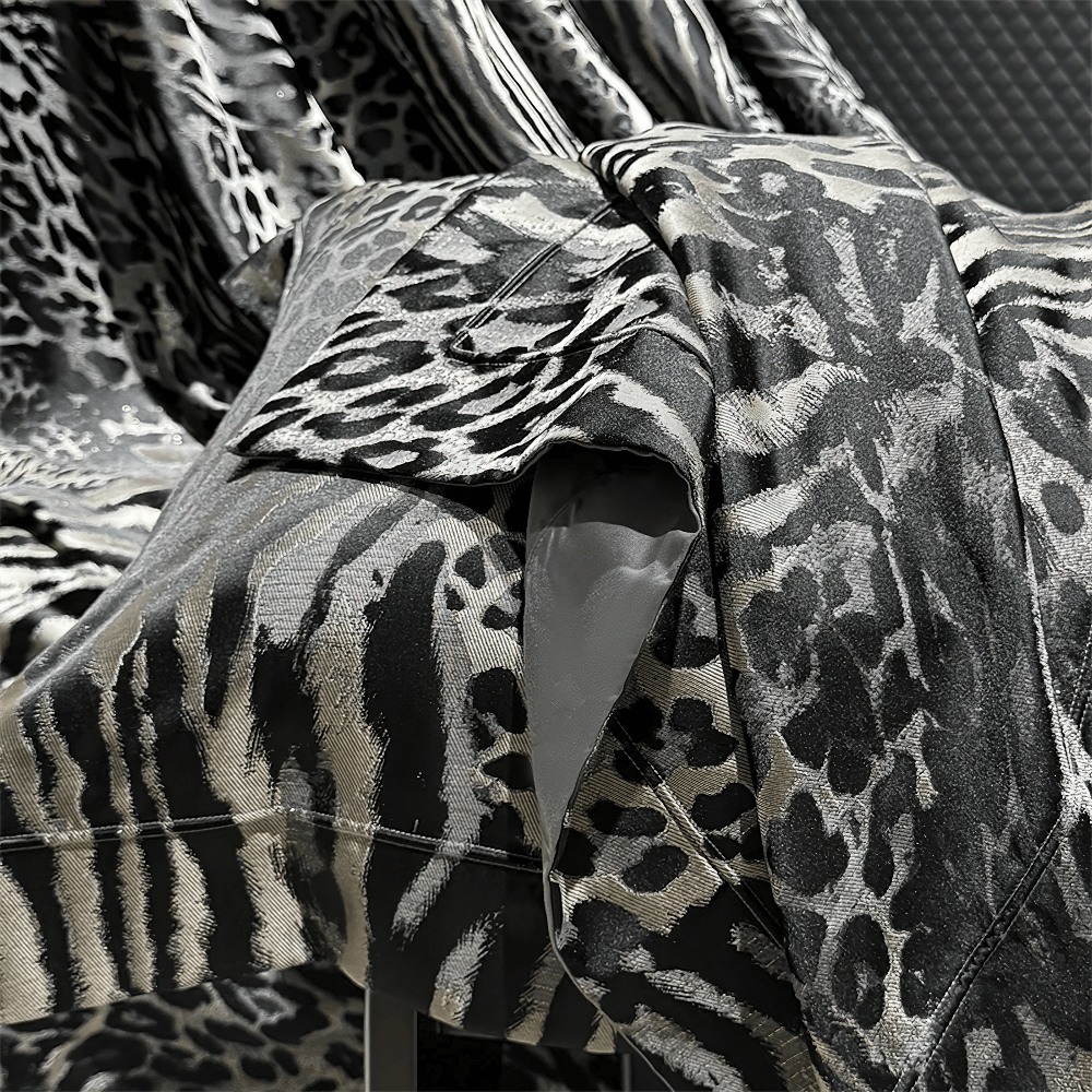 Luxury Leopard Jacquard Egyptian Cotton Bedding Set draped elegantly, showcasing luxurious fabric patterns.