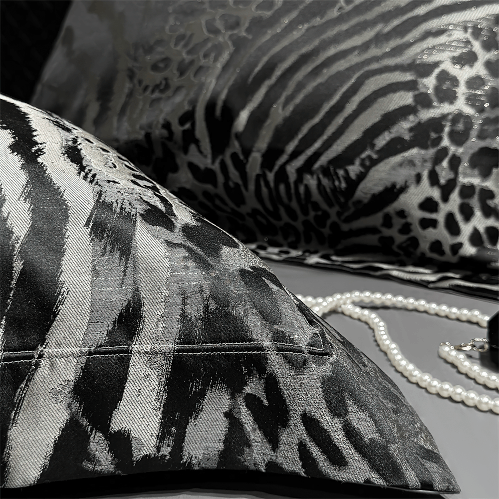 Luxury Leopard Jacquard Egyptian Cotton Bedding Set with elegant pillows and pearls.