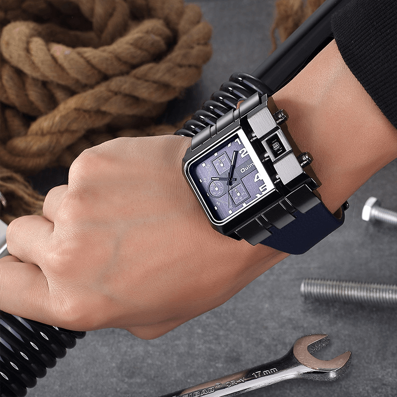 Luxury square dial quartz wristwatch on a wrist, showcasing a unique design and wide strap for a stylish look.