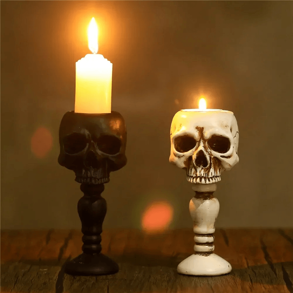 Macabre Skeleton Candle Stand for Haunted Decor featuring black and white skull candlesticks with taper candles.