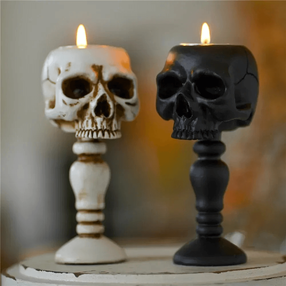 Macabre Skeleton Candle Stand for Haunted Decor featuring black and white skull candlesticks.