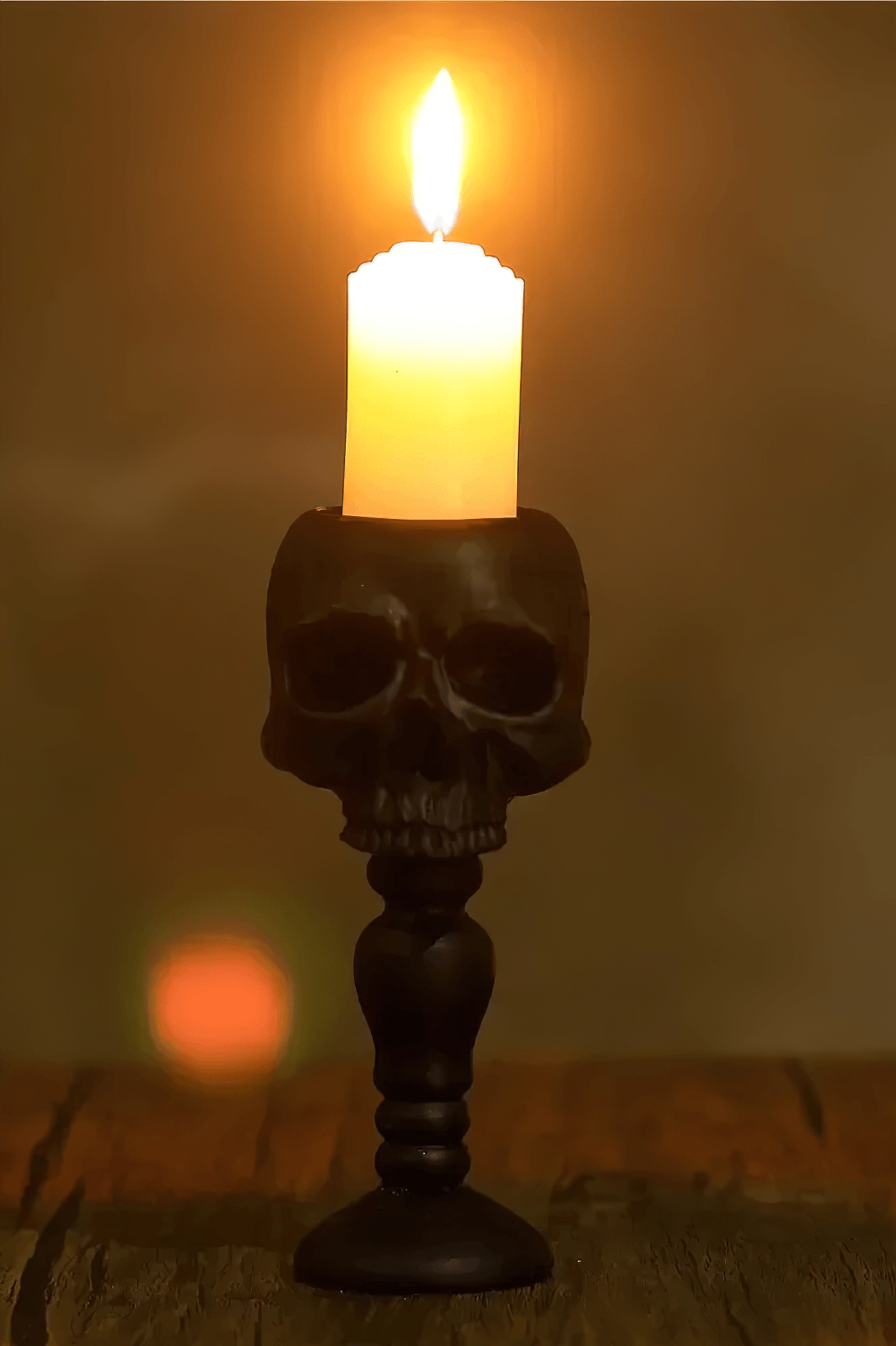 Macabre Skeleton Candle Stand for Haunted Decor with gothic skull design and flickering candle light.