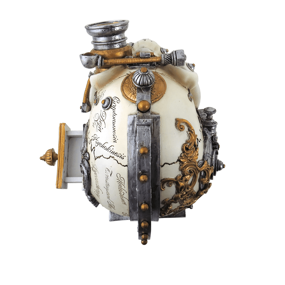 Macabre steampunk skull ornament with hidden drawer, featuring intricate gears and Victorian design.