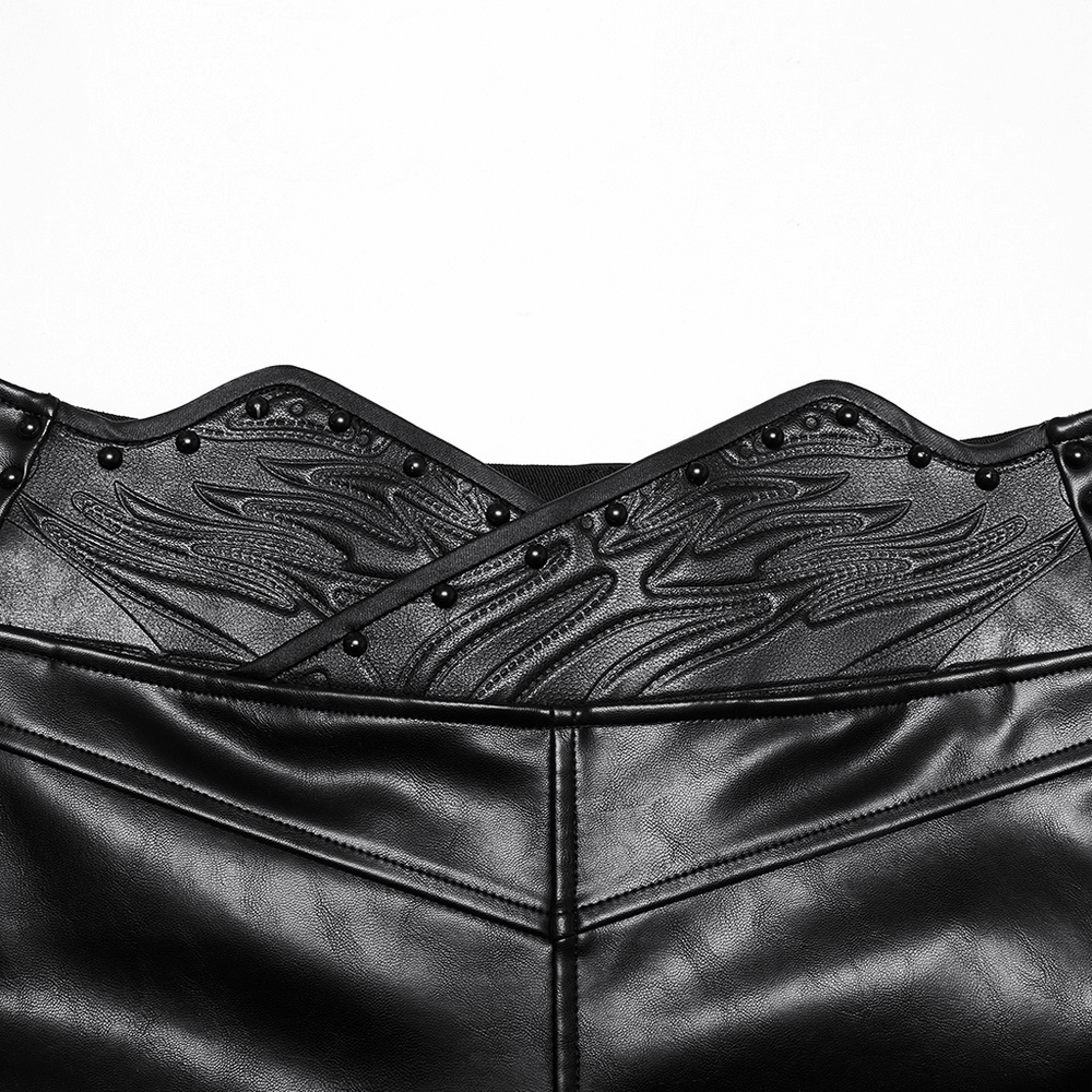 Close-up of 3D curved waistband on black faux leather pants with studded details for a punk aesthetic.