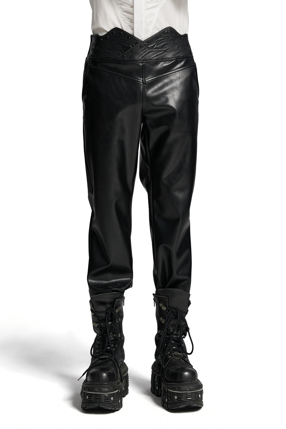 Male black faux leather pants with 3D curved waistband, studded details, and chunky boots for a punk minimalist style.