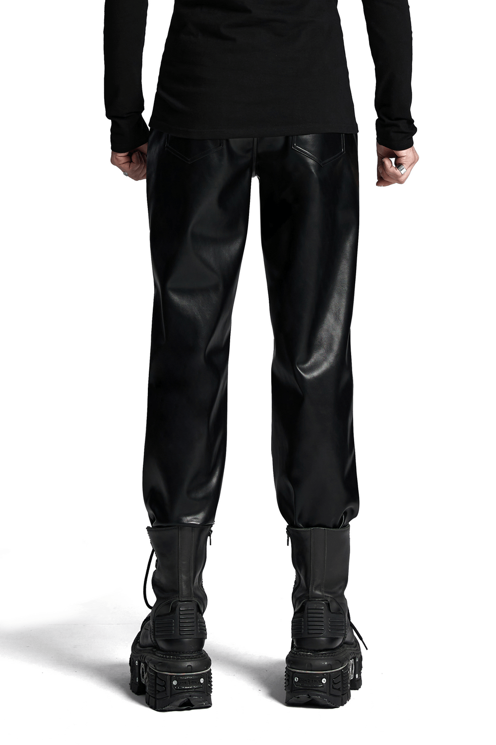 Stylish black faux leather pants with a 3D curved waistband, showcasing punk aesthetics and studded details from the rear view.