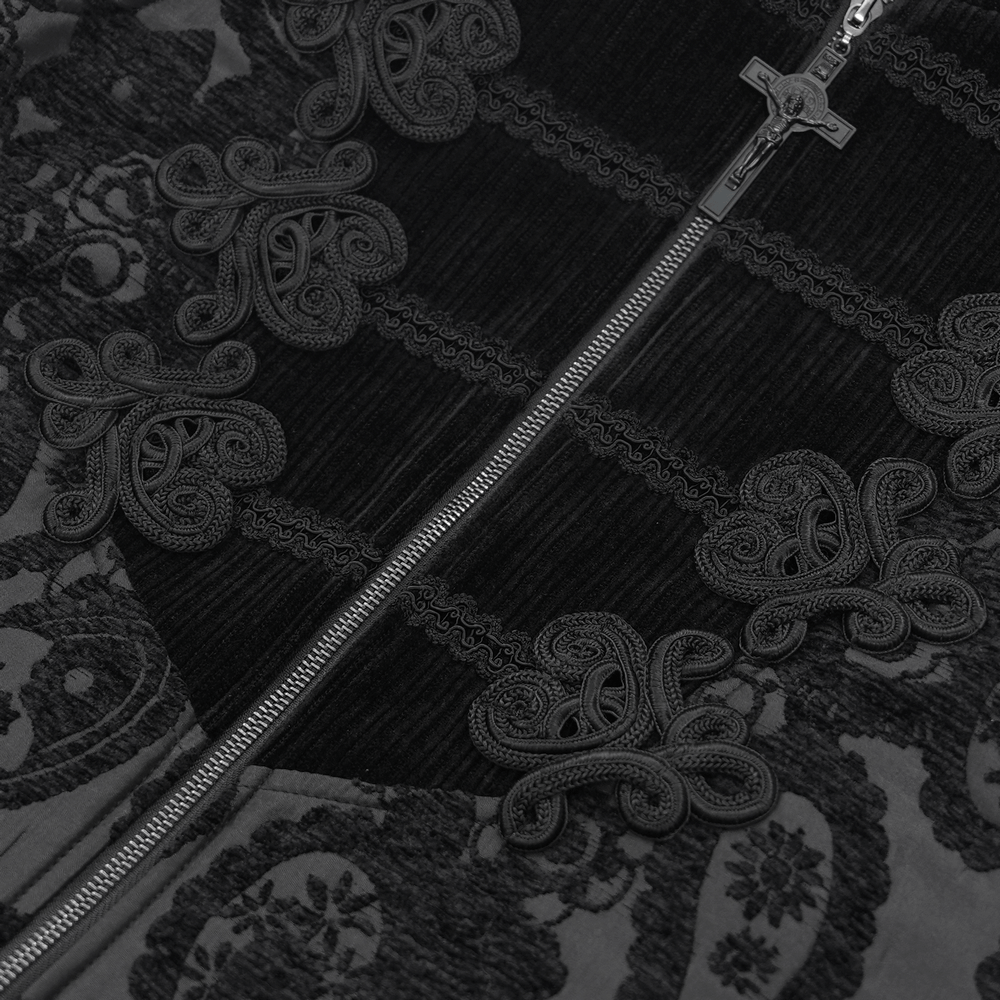 Close-up of a black brocade waistcoat featuring intricate embroidery and a front zipper closure. Sophisticated design details.