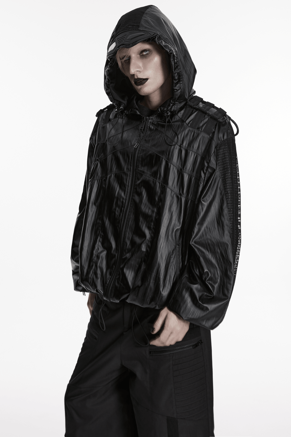 Male Black Cyberpunk Hooded Waterproof Mesh Jacket displayed on model with striking makeup and dark aesthetic.