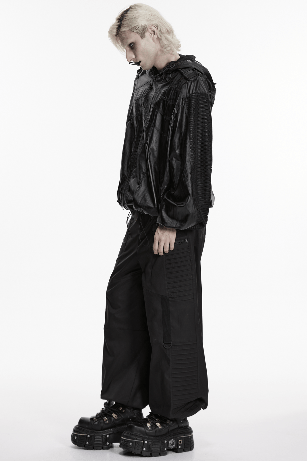 Male Black Cyberpunk Hooded Waterproof Mesh Jacket worn by a model in stylish black pants and chunky boots.