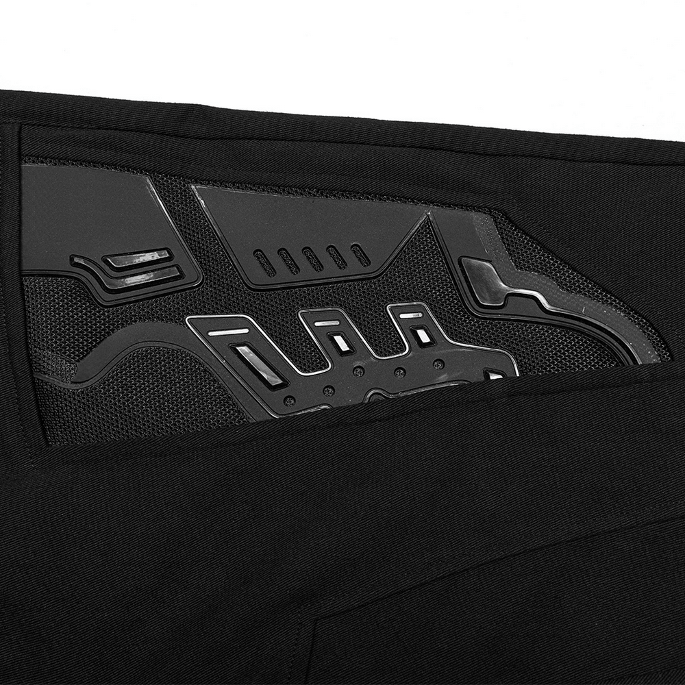 Close-up of 3D armor patch on black cyberpunk pants, showcasing stylish texture and detailing.