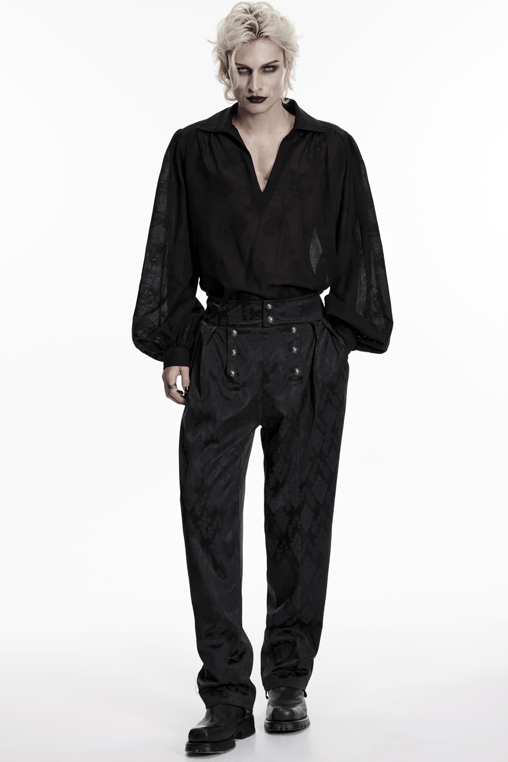 Male Black Gothic Jacquard Tapered Fit Trousers worn with a stylish black shirt and striking dark makeup.