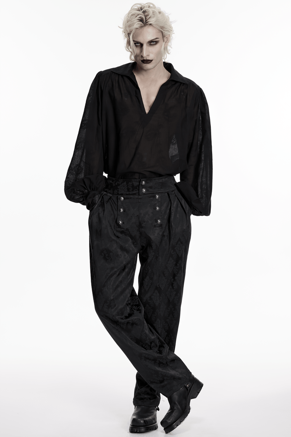 Male Black Gothic Jacquard Tapered Fit Trousers showcased with a black blouse for a stylish dark aesthetic.