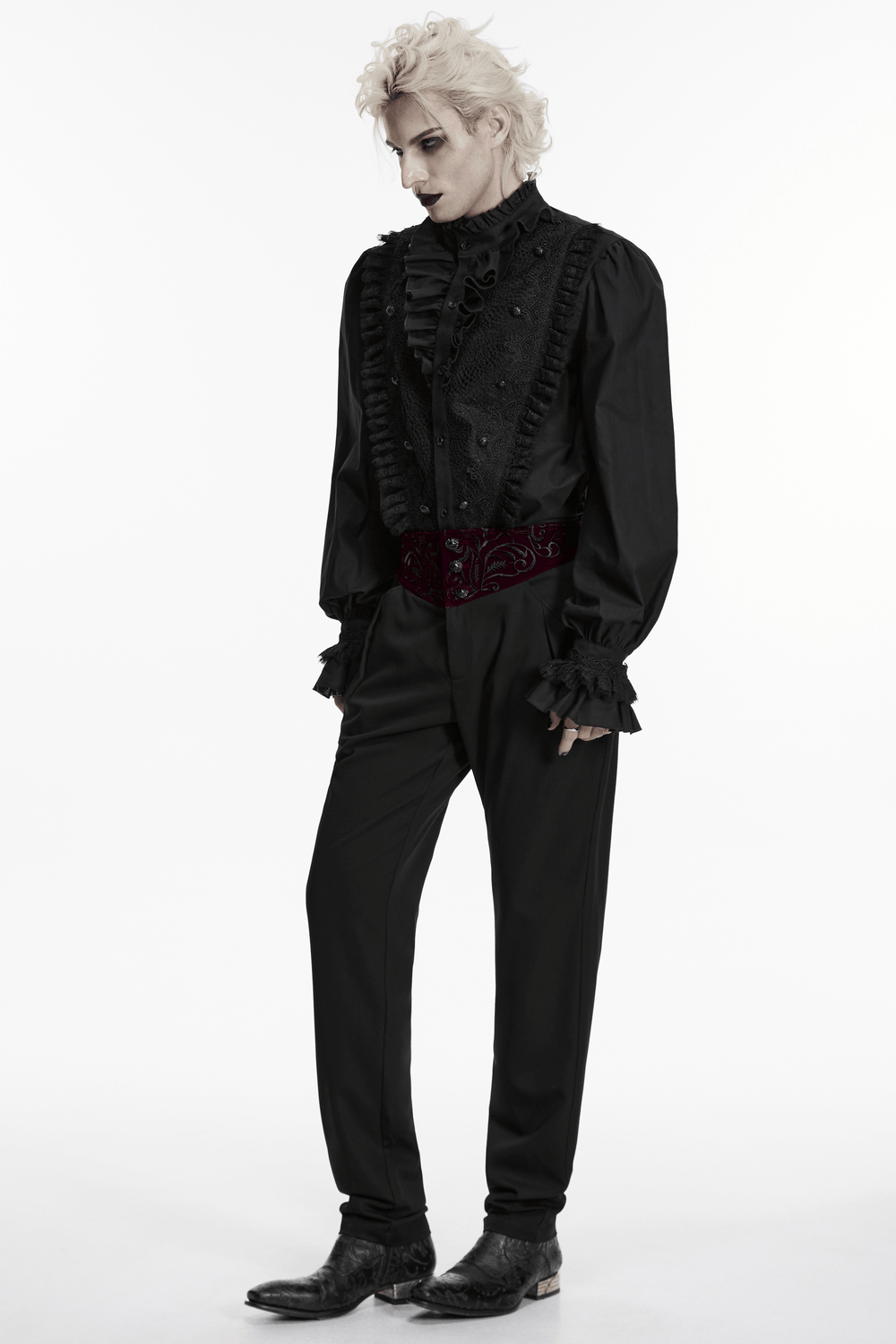 Male Black Gothic Trousers with Embroidered Velvet Waist styled with a black ruffled shirt and bold vampiric look.