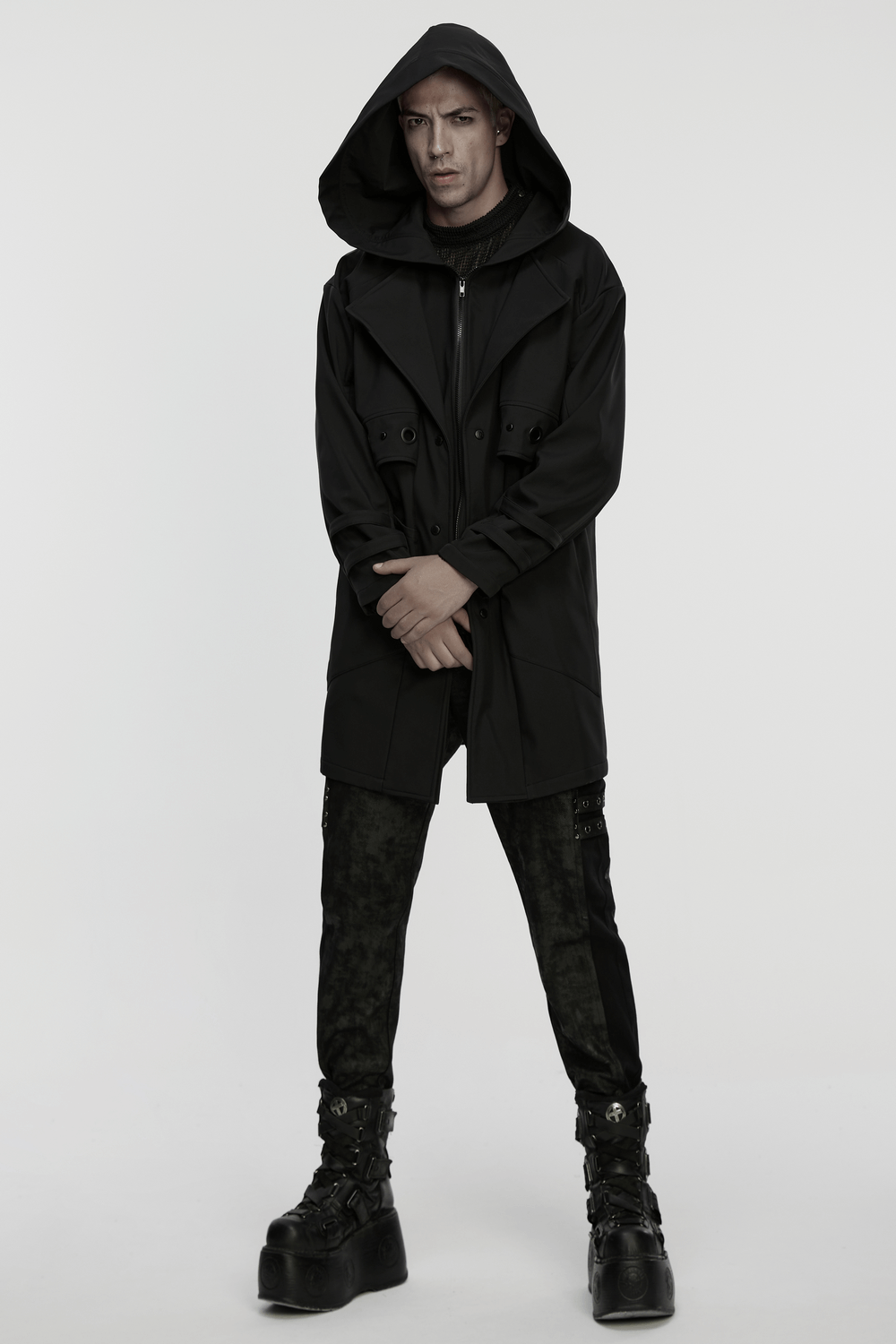 Male Black Hooded Techwear Jacket with Metal Accents showcased on a model in an urban setting.