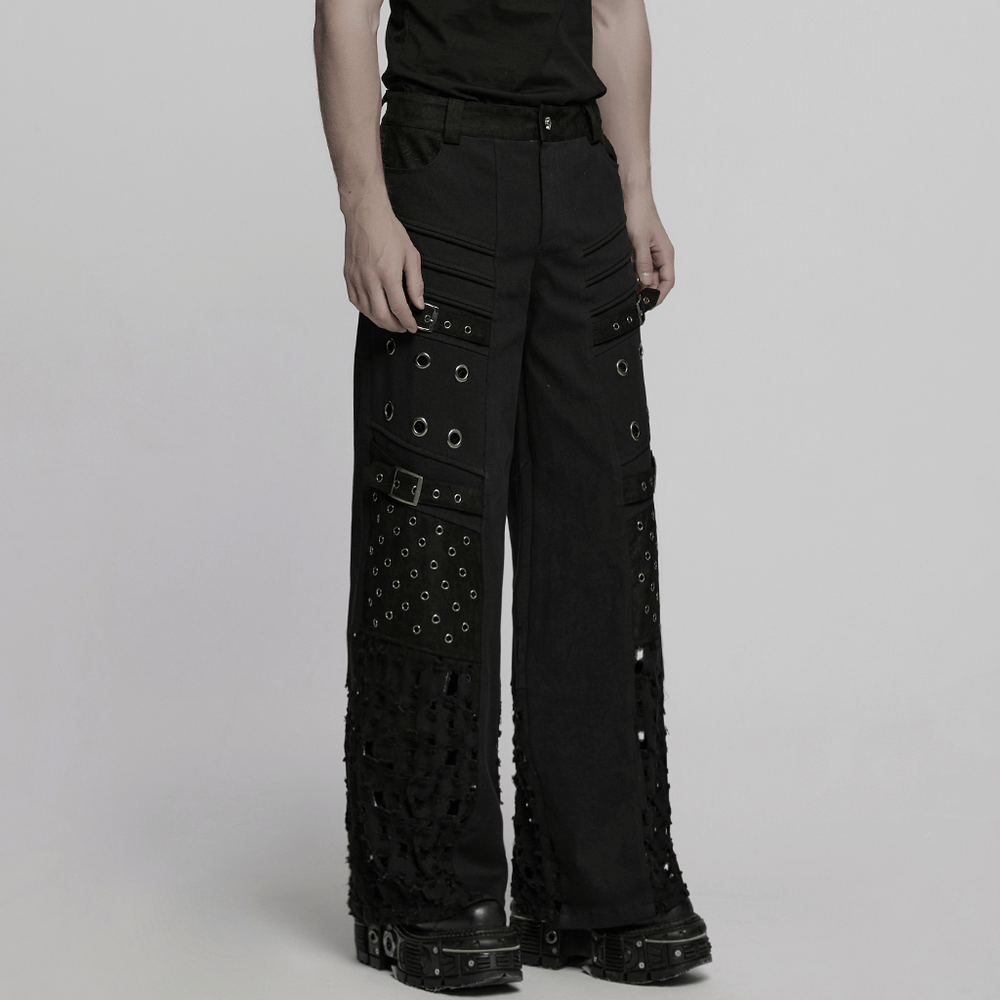 Male black punk pants featuring eyelets and mesh panels for a gothic cyber look.