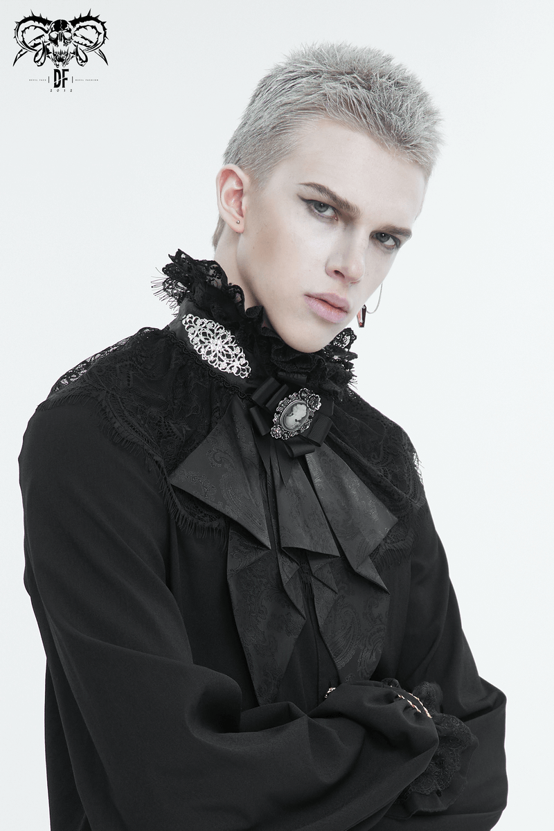 Male model in black gothic outfit with lace stand collar and ruffle bow tie, showcasing retro elegance.