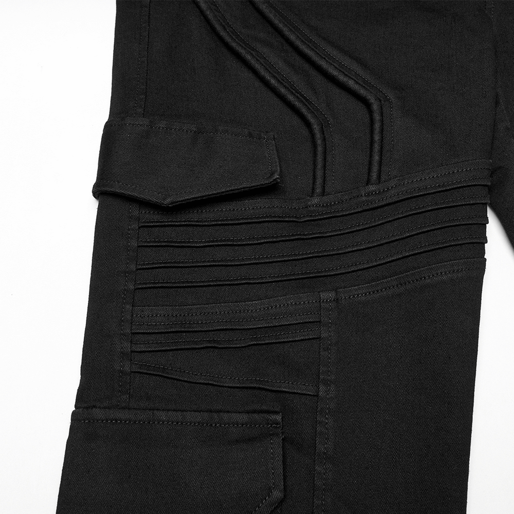 Close-up of black slim fit punk pants featuring stylish cargo pockets and unique pleated design.