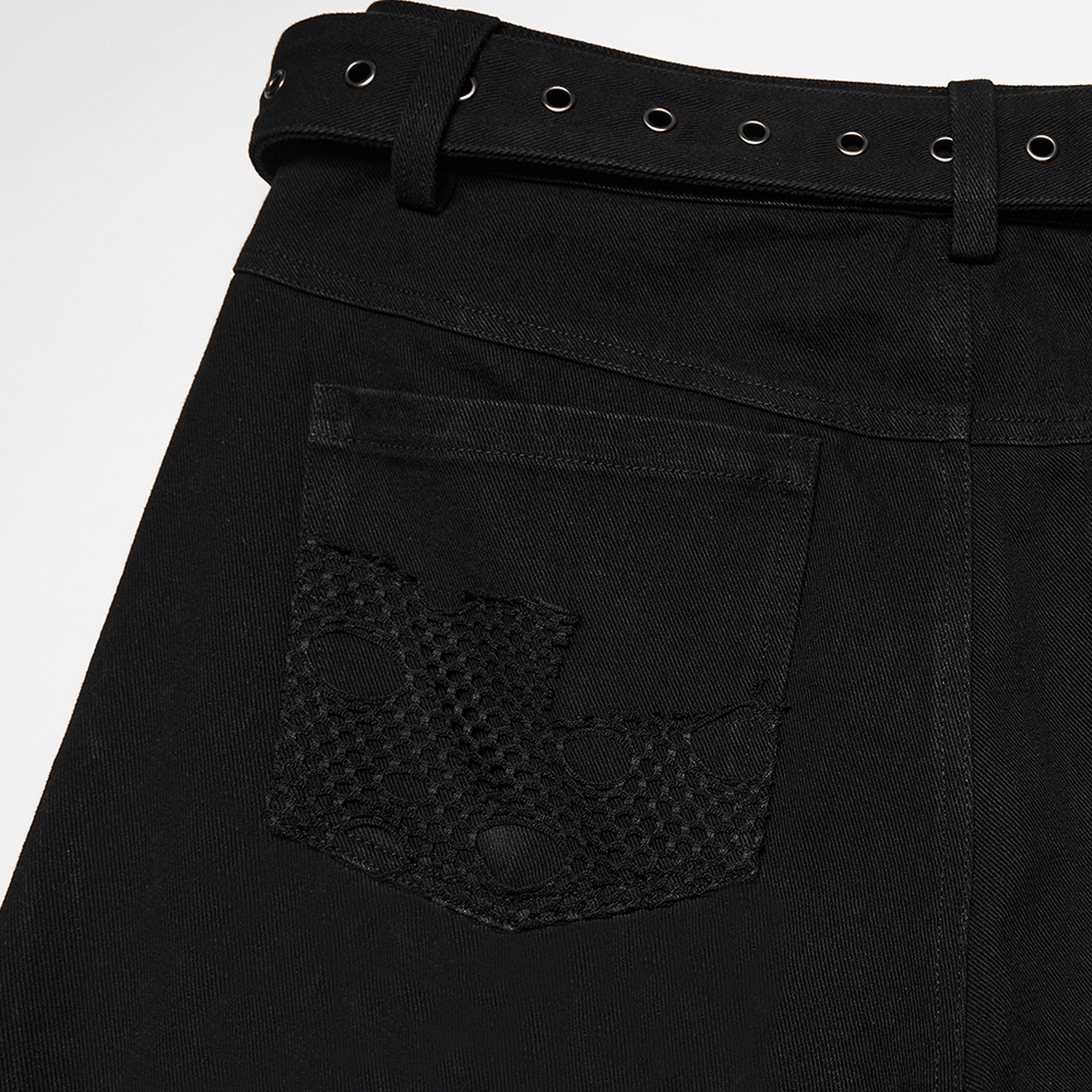 Close-up of Male Bold Punk Distressed Denim Pants with Studded Rips pocket featuring mesh detail and adjustable belt.