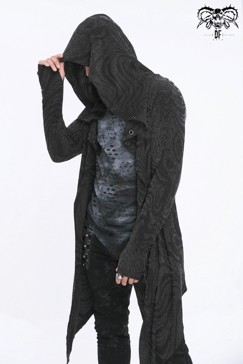 Male in a hooded gothic coat with an asymmetrical design, showcasing alternative style and dark fashion.