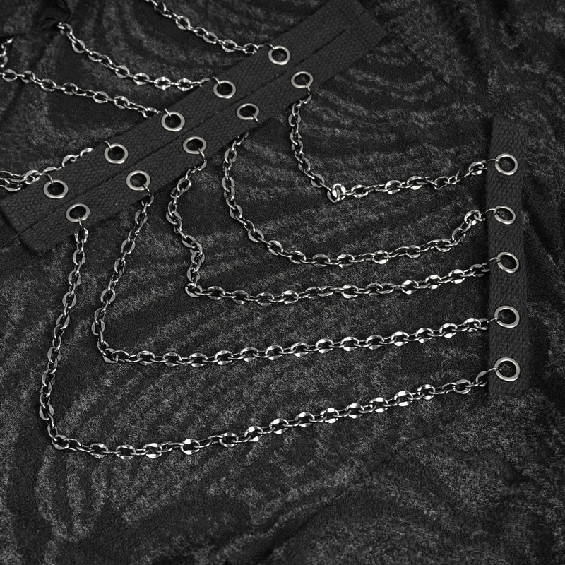 Close-up of multi-chain detailing on a gothic coat, showcasing bold and edgy alternative fashion.