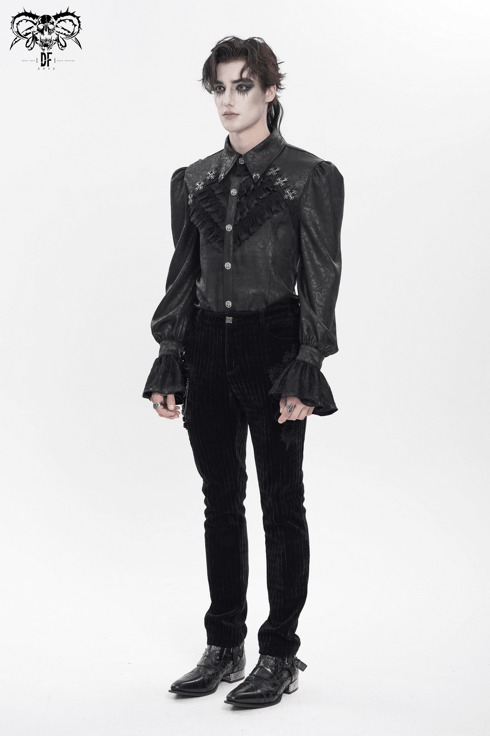 Male Gothic Jacquard Shirt With Ruffles and Puff Sleeves worn by a model in a dramatic pose.