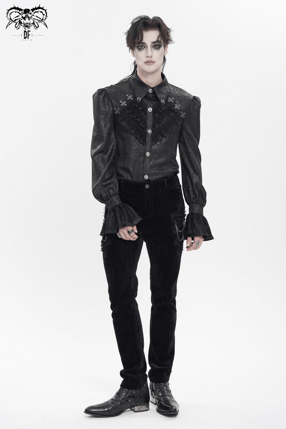 Male Gothic Jacquard Shirt With Ruffles and Puff Sleeves modeled with black corduroy pants and gothic boots.