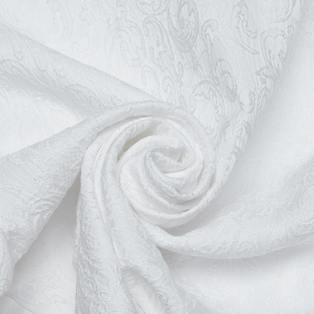 Luxurious white patterned fabric in a swirling fold, showcasing intricate woven details and a glossy finish.