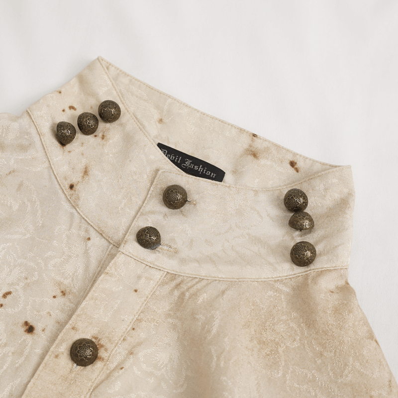 Close-up of a distressed men's shirt collar with decorative buttons and a fashion label.