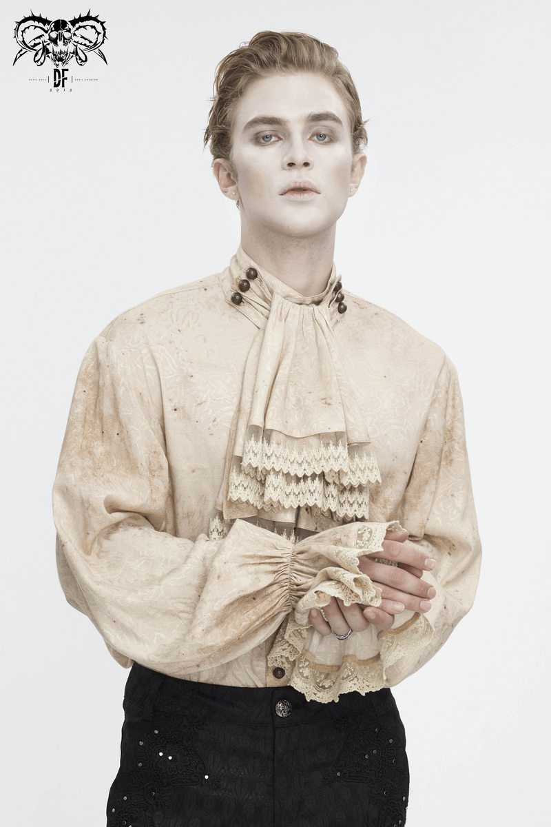 Male model in a vintage-inspired beige distressed shirt with lantern sleeves and a necktie.