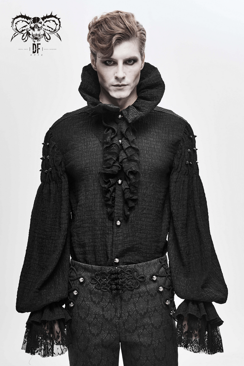 Male model wearing a black gothic vintage long-sleeve shirt with ruffles and elegant details.
