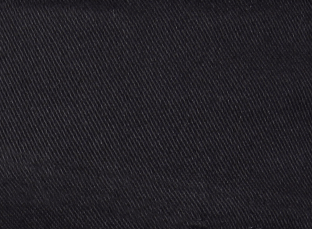 Close-up of black fabric texture for men's punk rock pants, ideal for stylish and edgy fashion.