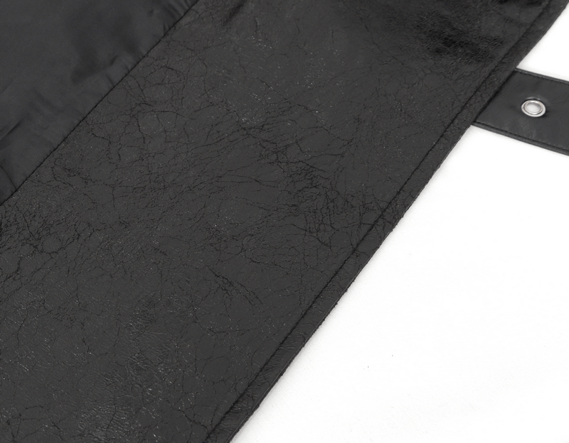 Close-up of textured black faux leather showcasing stylish details of a punk-inspired coat.