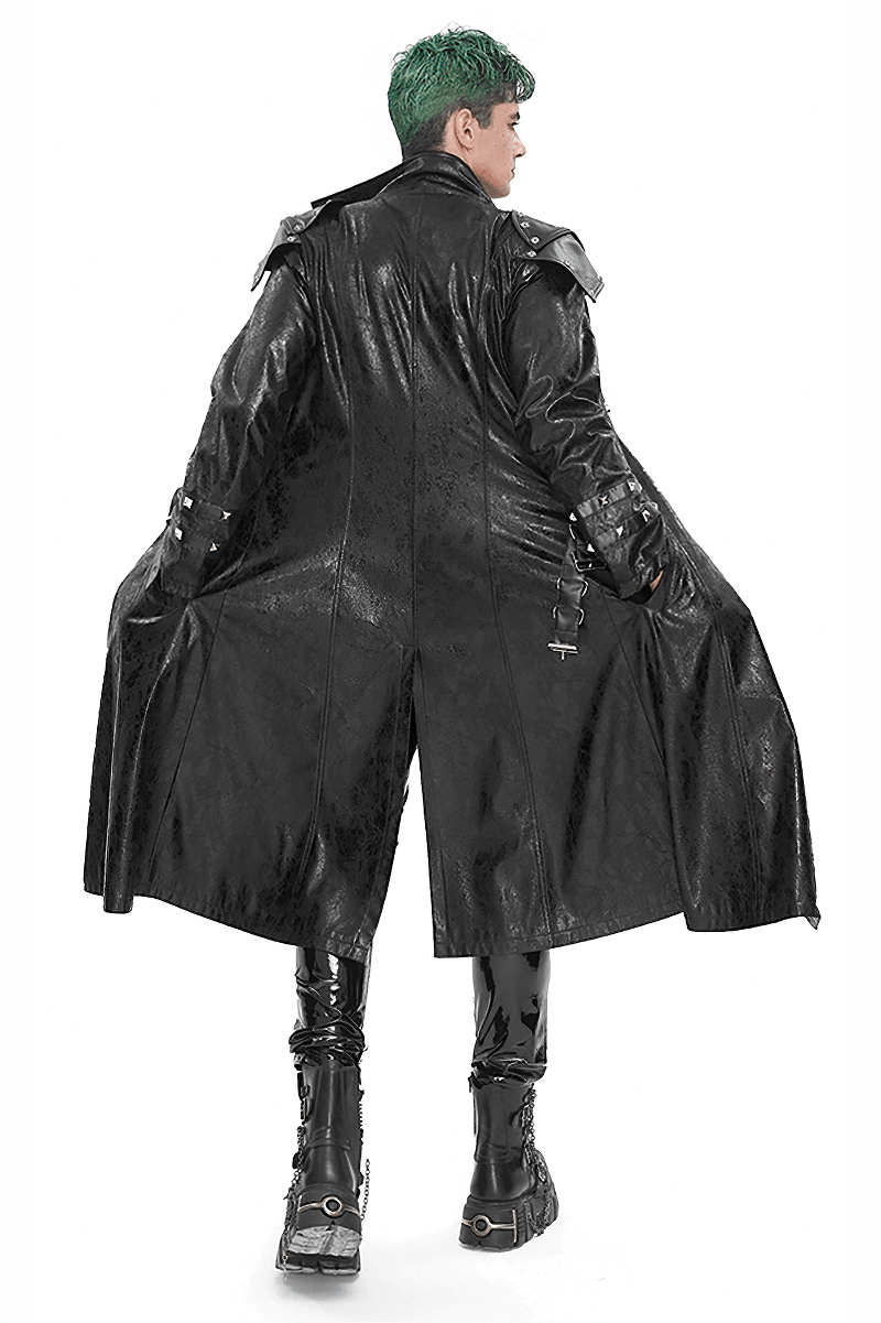 Back view of a male model wearing a punk stand collar faux leather coat with a dramatic flair.