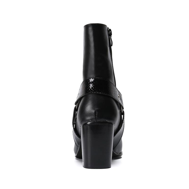 Rear view of stylish male real leather ankle boots with high heels and metal decoration.