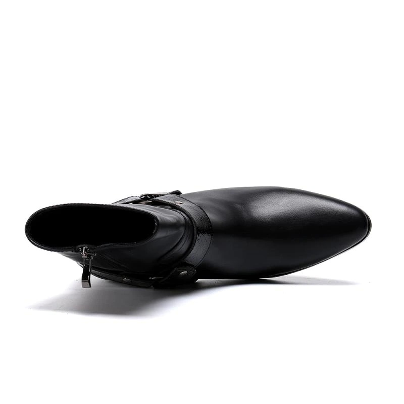 Stylish men's black leather ankle boots with pointed toe and zip detail, perfect for fashion-forward footwear choices.